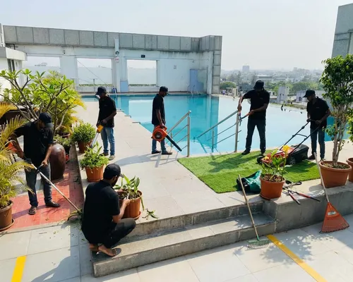 Pune Greens team working at a commercial garden in Pune